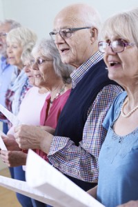 61521439 - group of seniors singing in choir together